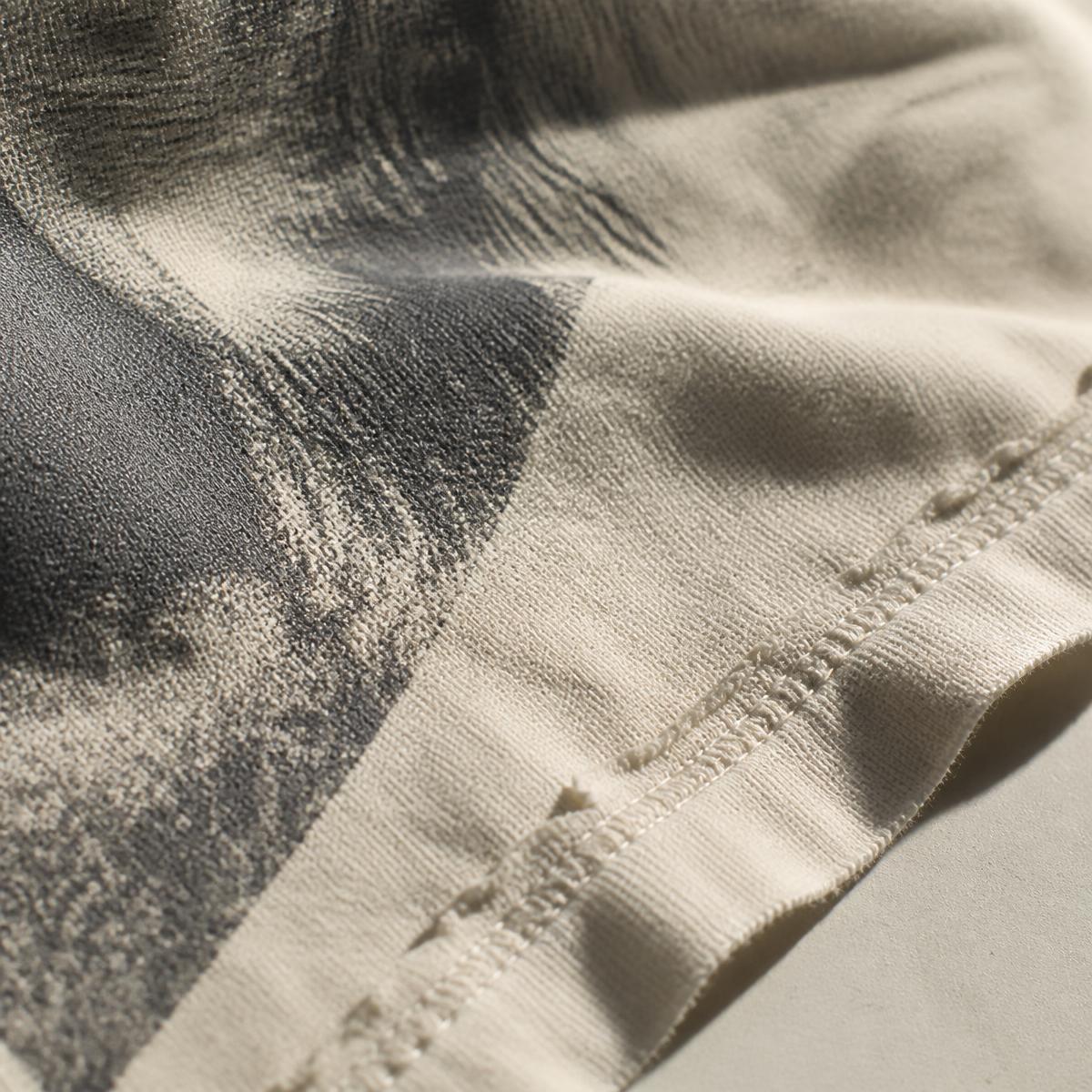 Tonal screen print detail on bone cotton